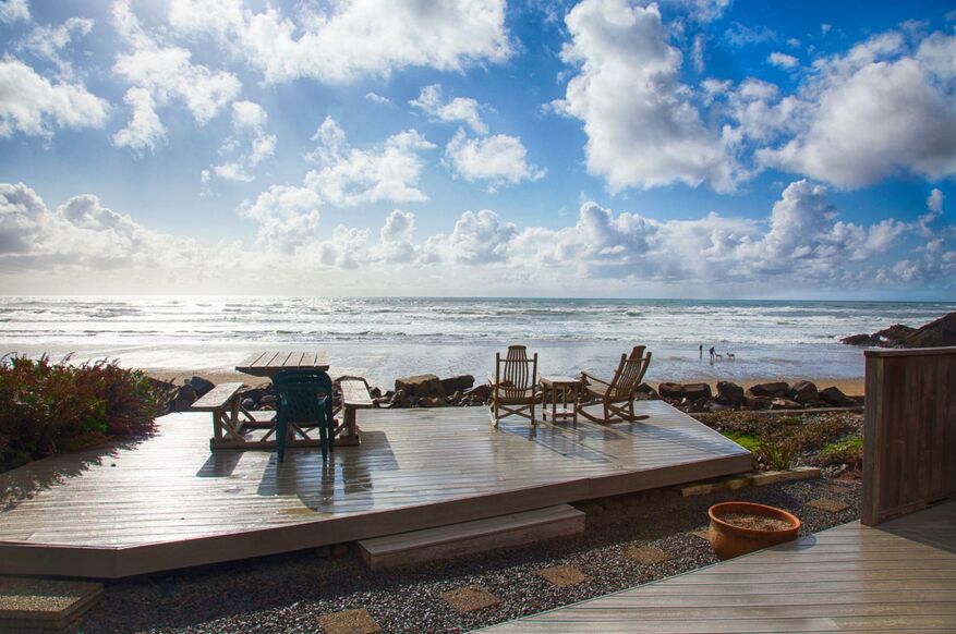 a composite deck by a beach with deck fascia screws