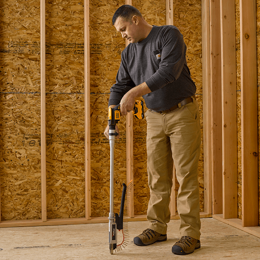 A professional is using the FastenMaster PAMfast system for a subfloor job.